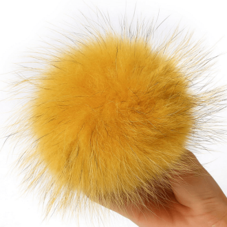 Gele bonten pompon ca. 15cm met drukknoop