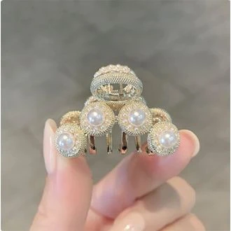 Vier parels haarklem