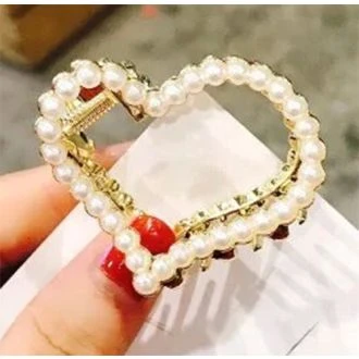 Gouden haarklem hartje parel