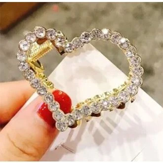 Gouden haarklem hartje strass