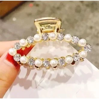 Gouden haarklem parel/strass ovaal