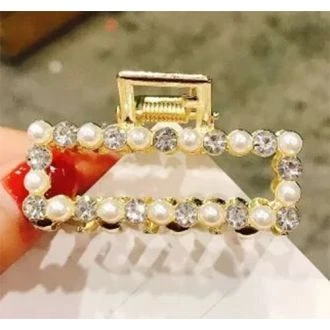 Gouden haarklem hartje strass