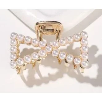 Gouden haarklem strikje parel