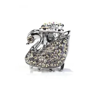 Zwaan metalen haarklem met gele strass steentjes